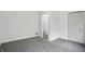 This bright bedroom has fresh neutral paint, updated carpet, and a closet at 3307 N College Ave, Indianapolis, IN 46205