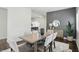 Elegant dining space showcasing a sleek table, seating for six, and stylish decor at 3307 N College Ave, Indianapolis, IN 46205