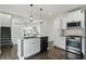 Contemporary kitchen with an island, stainless steel appliances, and sleek design at 3307 N College Ave, Indianapolis, IN 46205