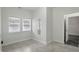 This room features fresh neutral paint, modern floors, and a pass-through window at 3307 N College Ave, Indianapolis, IN 46205