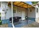 The back patio features a grill, seating, and a view of the backyard at 3329 Main St, Anderson, IN 46013