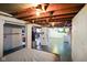 Basement with unfinished ceiling, open layout and painted walls plus visible ductwork at 3329 Main St, Anderson, IN 46013