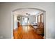 An archway frames the living room, revealing hardwood floors and natural light at 3329 Main St, Anderson, IN 46013
