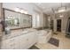 A luxurious bathroom with granite countertops, a soaking tub, and a walk-in glass shower at 3429 Woodham Pl, Carmel, IN 46033
