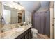 Cozy bathroom with stylish granite countertops, a walk-in shower, and ample storage space at 3429 Woodham Pl, Carmel, IN 46033