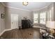 Comfortable bedroom with hardwood floors, natural light, and stylish décor at 3429 Woodham Pl, Carmel, IN 46033