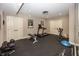 Home gym with treadmill, free weights, and workout equipment, designed for fitness enthusiasts at 3429 Woodham Pl, Carmel, IN 46033