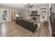 Cozy living room with fireplace, built-in shelves, and comfortable seating area at 3429 Woodham Pl, Carmel, IN 46033