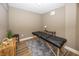 Versatile bonus room with a massage table, perfect for relaxation or a home spa at 3429 Woodham Pl, Carmel, IN 46033
