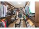 A spacious walk-in closet with custom shelving and storage solutions, perfect for organization at 3429 Woodham Pl, Carmel, IN 46033