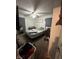 Bedroom with a ceiling fan and a small air conditioning unit in the window at 3440 Brewer Dr, Indianapolis, IN 46222