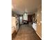 Kitchen with exposed framing, basic appliances, and potential for renovation at 3440 Brewer Dr, Indianapolis, IN 46222