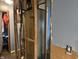 Unfinished room showcasing exposed framing and utilities, ready for updates at 3440 Brewer Dr, Indianapolis, IN 46222
