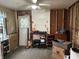 Unfinished room with exposed framing, a white door, and potential for customization at 3440 Brewer Dr, Indianapolis, IN 46222