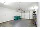 A clean and organized garage with ample storage space, ready for your vehicles and projects at 409 Hanley St, Plainfield, IN 46168