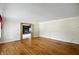 Spacious living room featuring gleaming hardwood floors and a bright, open atmosphere at 409 Hanley St, Plainfield, IN 46168