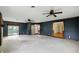 Living room with ceiling fans, and brick fireplace at 409 Hanley St, Plainfield, IN 46168