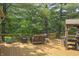 Inviting back deck offers ample seating and a built-in grill, perfect for outdoor entertaining at 4126 E Rembrandt Dr, Martinsville, IN 46151