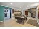 Finished basement with a pool table, spiral staircase, and bar seating, perfect for entertaining at 4126 E Rembrandt Dr, Martinsville, IN 46151