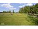 Sprawling community lawn featuring picnic areas, a fire hydrant, and wooded views at 4126 E Rembrandt Dr, Martinsville, IN 46151