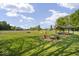 Vast community lawn area offers picnic spots, a fire hydrant, and lush green scenery at 4126 E Rembrandt Dr, Martinsville, IN 46151