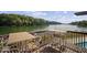 Inviting outdoor deck area with stylish patio furniture and serene lake views at 4126 E Rembrandt Dr, Martinsville, IN 46151