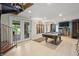 Finished basement featuring spiral staircase, pool table, and entertainment area with lake views at 4126 E Rembrandt Dr, Martinsville, IN 46151