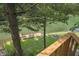 Scenic lake view from a back deck, featuring a wooden dock and lush greenery for tranquil scenery at 4126 E Rembrandt Dr, Martinsville, IN 46151