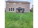Well-maintained backyard features a gazebo and lush lawn, great for outdoor entertaining at 4216 Lauder Rd, Bargersville, IN 46106