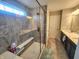 Beautiful bathroom showcasing a glass shower with gray tile and a built-in bench at 4216 Lauder Rd, Bargersville, IN 46106