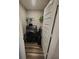 Convenient laundry room featuring a modern washer and dryer set with shelving for supplies at 4216 Lauder Rd, Bargersville, IN 46106