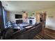 Comfortable living room featuring a large sectional sofa, fireplace, and media center for relaxation and entertainment at 4216 Lauder Rd, Bargersville, IN 46106