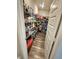 Walk-in pantry with wire shelving stocked with various food items and supplies for convenient storage at 4216 Lauder Rd, Bargersville, IN 46106