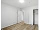 Bedroom features wood floors, closet, and door that leads to hallway at 4221 Haverhill Dr, Anderson, IN 46013