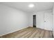 Bright bedroom with wood floors and closet with sliding doors at 4221 Haverhill Dr, Anderson, IN 46013