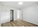Bright bedroom with wood floors and closet with sliding doors at 4221 Haverhill Dr, Anderson, IN 46013