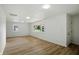 Bright living room featuring wood floors, recessed lighting, and large windows at 4221 Haverhill Dr, Anderson, IN 46013
