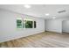 Bright Living Room features wood floors and natural light from the windows at 4221 Haverhill Dr, Anderson, IN 46013
