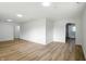 Spacious Living Room features wood floors, recessed lighting, and arched doorways at 4221 Haverhill Dr, Anderson, IN 46013