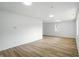 Empty Living Room features wood floors, recessed lighting, and neutral paint at 4221 Haverhill Dr, Anderson, IN 46013