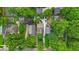 Aerial view of property showing a lush landscape, driveway, and surrounding neighborhood at 4732 N Kenwood Ave, Indianapolis, IN 46208