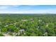 A peaceful, aerial view of the property's surrounding community, with distant city views at 4732 N Kenwood Ave, Indianapolis, IN 46208