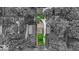 An aerial view highlights the property boundaries and its location in a tree-lined neighborhood at 4732 N Kenwood Ave, Indianapolis, IN 46208