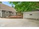 This home has a delightful backyard space, featuring a patio area and detached garage at 4732 N Kenwood Ave, Indianapolis, IN 46208