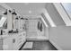 Modern bathroom with dual showers, skylights, and a double vanity at 4732 N Kenwood Ave, Indianapolis, IN 46208