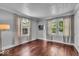 Cozy bedroom with natural light, classic decor, and hardwood floors at 4732 N Kenwood Ave, Indianapolis, IN 46208