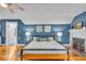 Bright bedroom with hardwood floors, soft lighting, and modern decor at 4732 N Kenwood Ave, Indianapolis, IN 46208