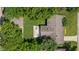 Birds eye aerial view of backyard with a deck, chairs and well kept lawn at 4742 Kingsley Dr, Indianapolis, IN 46205