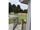 Backyard with a shed, garden bed, pool and wooden fencing from wood deck at 4760 Winterberry Pl, Columbus, IN 47201