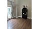 Hardwood floors, backyard view, and built-in shelving make this a wonderful place to relax at 4760 Winterberry Pl, Columbus, IN 47201
